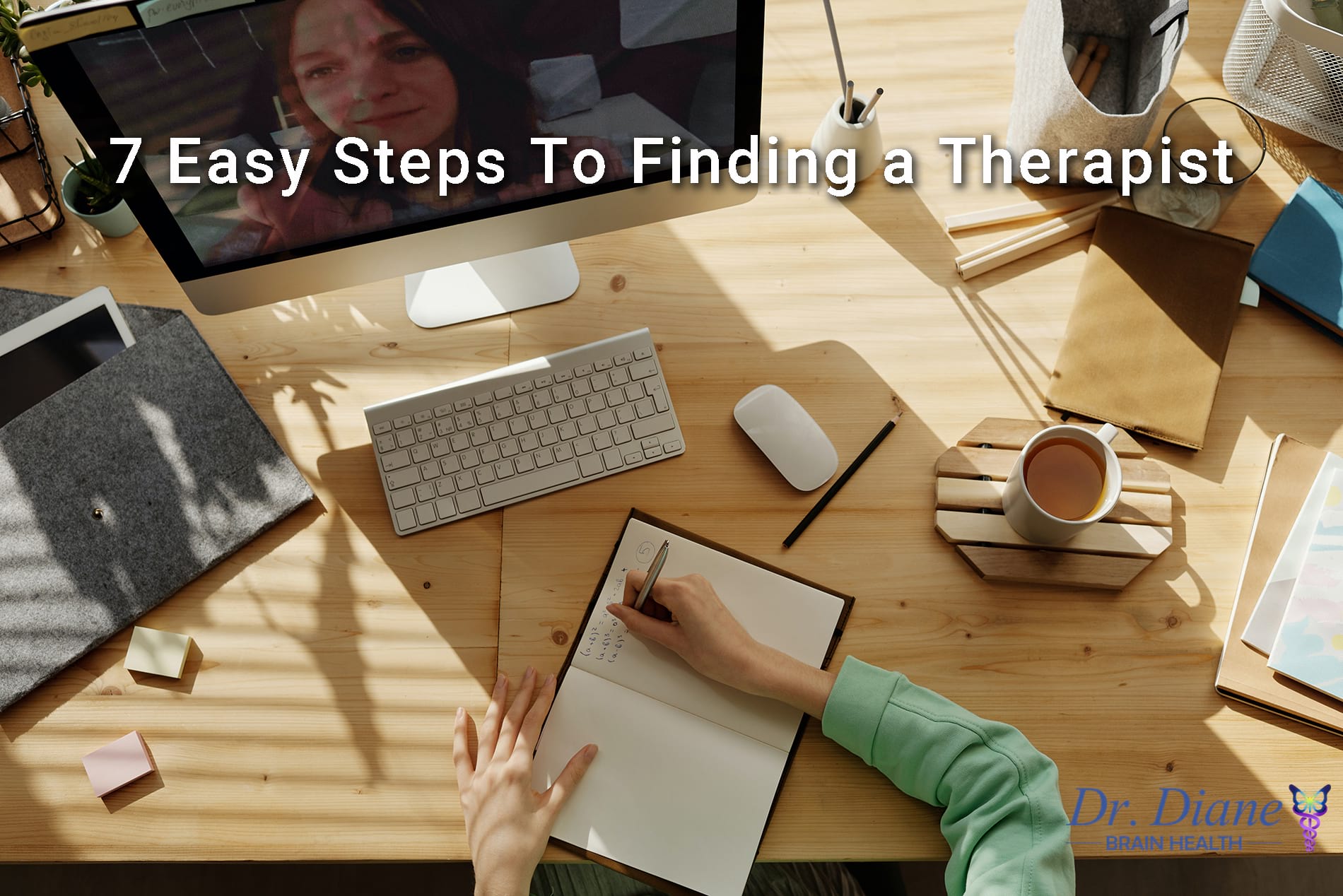 Women at desk writing down the 7 easy steps to finding a therapist. 